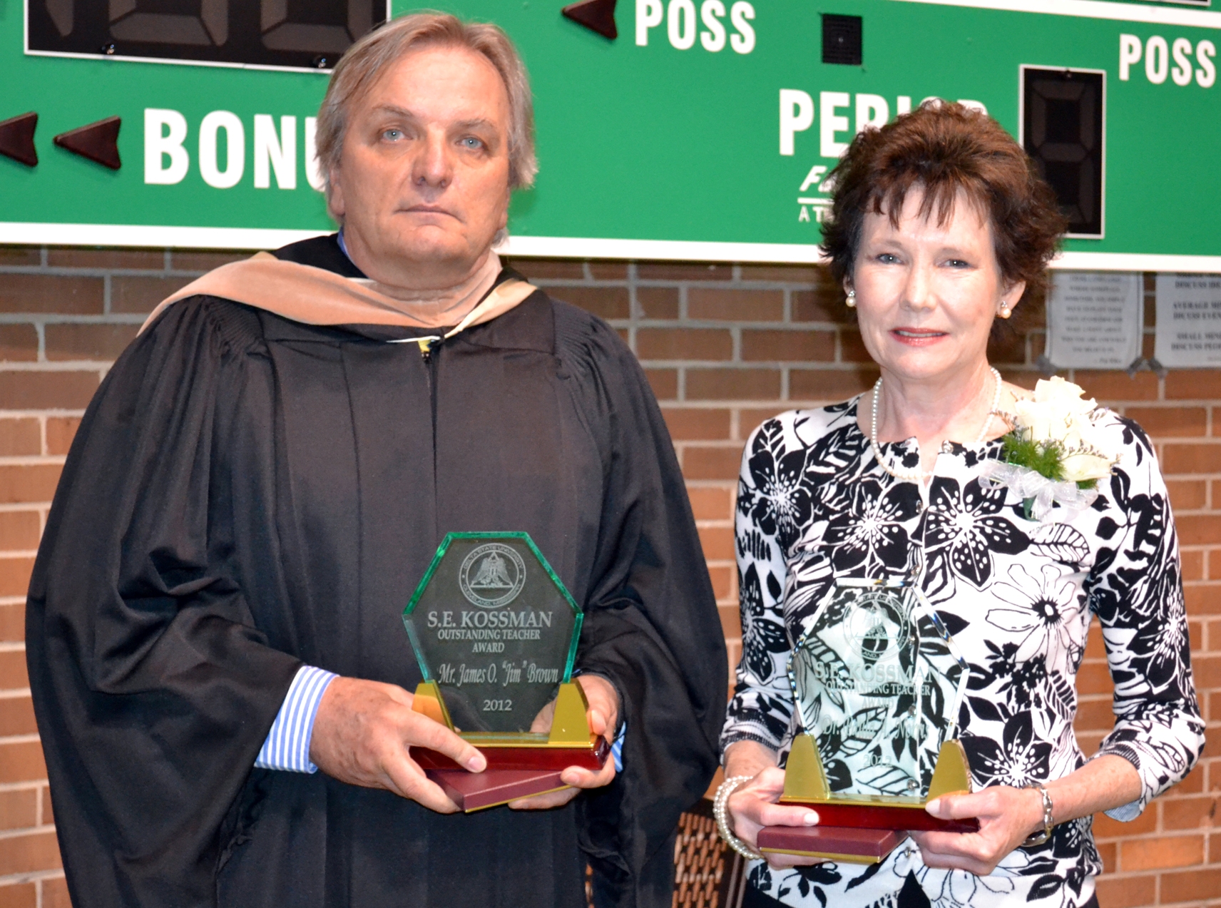 PHOTO:  Delta State University Instructor of Insurance James O. (Jim) Brown and Professor of Mathematics Dr. Paula Norris were co-recipients of the S.E. Kossman Outstanding Faculty Award presented during Spring 2012 Commencement.